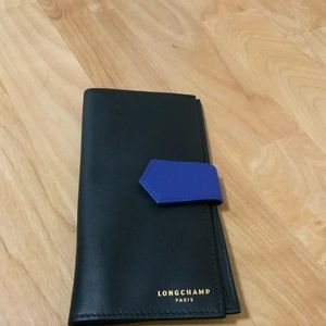 Brand new Longchamp Travel wallet in pure leather
